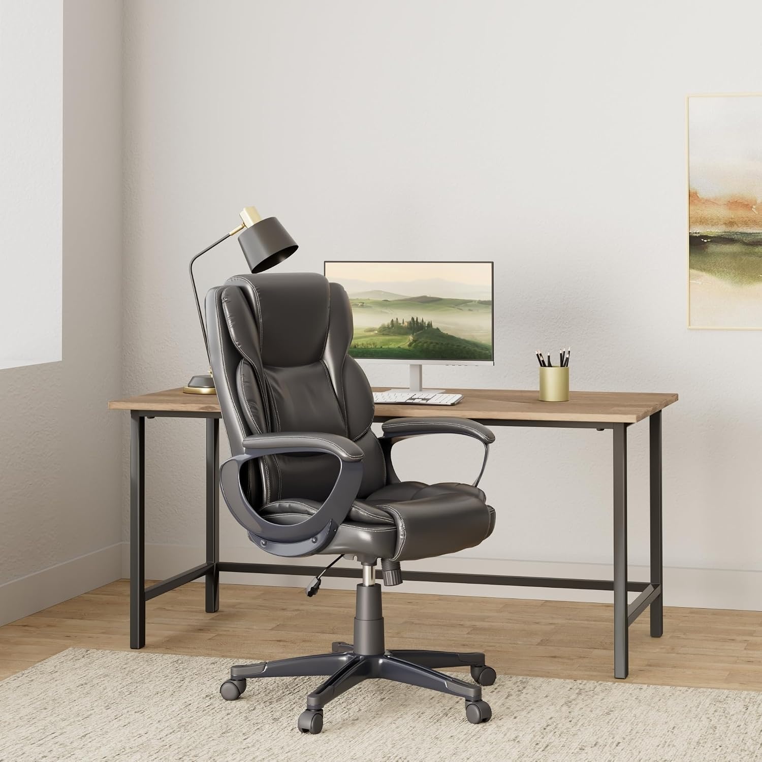 image:imageSTAPLES Sorina Bonded Leather Chair Adjustable Office Chair with Plush Padding Provides Lumbar Arm and Head Support Perfect Desk Chair for The Modern OfficeBlack